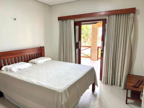 Giường trong phòng chung tại Beach House