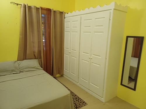 Llit o llits en una habitació de Millennium View Villa - 2