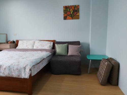 Postel nebo postele na pokoji v ubytování Chin-Lan B&B