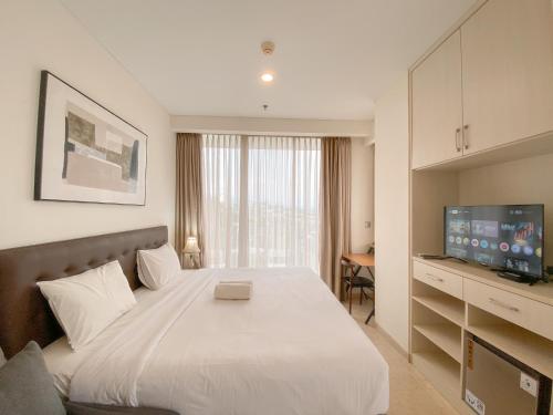 Postel nebo postele na pokoji v ubytování Signature Studio Apartment with Jacuzzi at Art Deco By Travelio