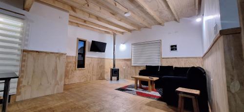 Un televizor și/sau centru de divertisment la Refugio Tringlo