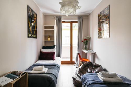 Posteľ alebo postele v izbe v ubytovaní Harmonica Home - LoftAffair