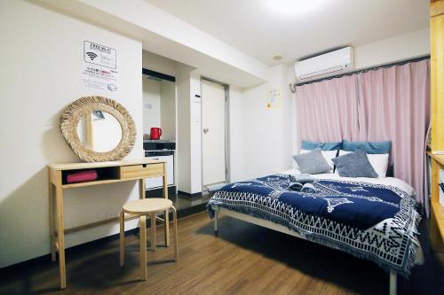 Llit o llits en una habitació de Nogata House