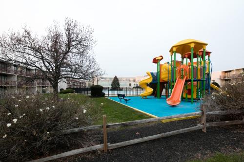 a playground with a slide in a park at Red Lion Hotel Harrisburg Hershey in Harrisburg
