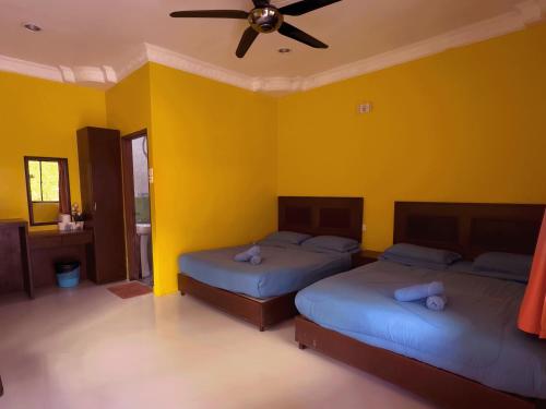 Cama o camas de una habitación en ABC Chalet Tioman