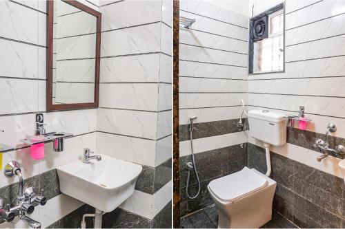 Ένα μπάνιο στο FabHotel Rising Surya - Nr Embassy Tech Zone