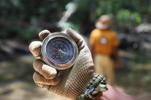 a person holding a watch in their hand at Gal Oya Camping in Inginiyagala