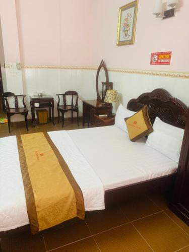 Katil atau katil-katil dalam bilik di Minh Hiếu Airport Hotel - Cách Sân Bay 1 Km
