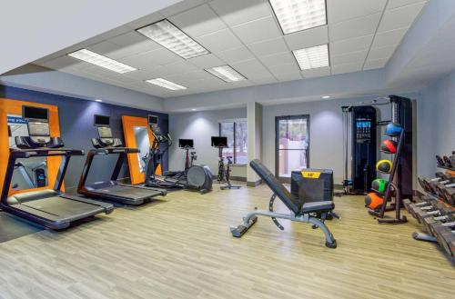 a gym with several exercise bikes and treadmills at Hampton Inn Jacksonville - I-95 Central in Jacksonville