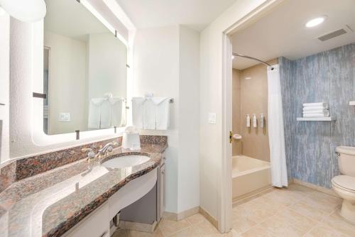 a bathroom with a sink and a toilet at Homewood Suites by Hilton East Rutherford - Meadowlands, NJ in East Rutherford