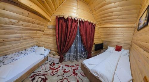 Postel nebo postele na pokoji v ubytování Cabana MARA