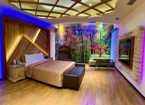 Postel nebo postele na pokoji v ubytování Wei Feng Exquisite Motel Pintung Branch
