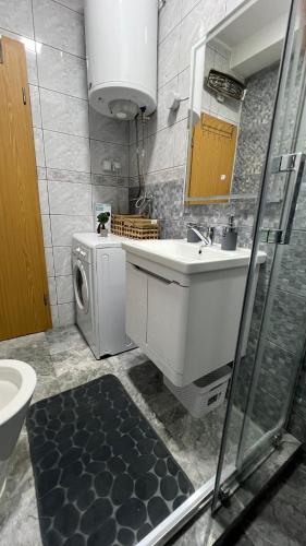 Kupatilo u objektu UrbanStar rent