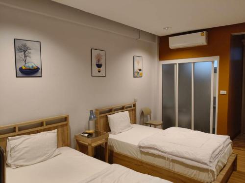 Postel nebo postele na pokoji v ubytování T3 Residence