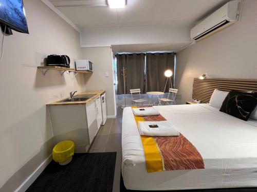 Postel nebo postele na pokoji v ubytování Kalua Motel