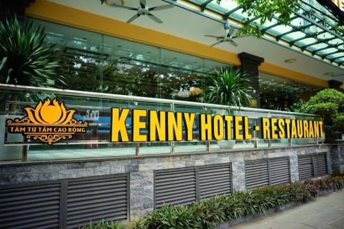 a hotel sign on the side of a building at Kenny Hotel Ha Long in Ha Long