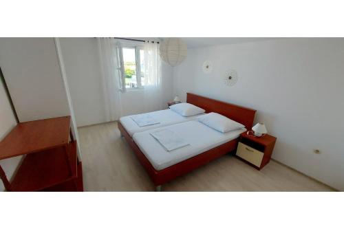 Postel nebo postele na pokoji v ubytování House Katarina