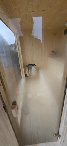 an overhead view of a room with a wooden floor at MAESTRo TWO in Tychy