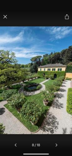 a picture of a garden with a building in the background at Casa Limonaia a Perugia in Perugia