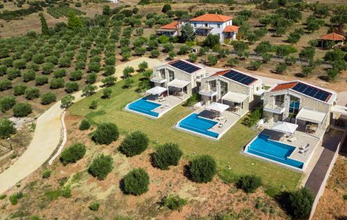an aerial view of a house with solar panels at Nikiti Dream Villas in Nikiti