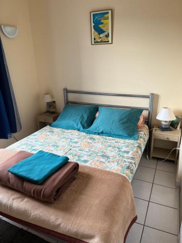 Postel nebo postele na pokoji v ubytování Aloès