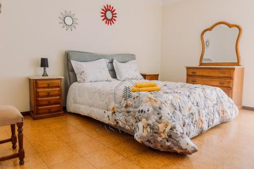 Ένα ή περισσότερα κρεβάτια σε δωμάτιο στο Casa do Rio