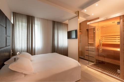 Posteľ alebo postele v izbe v ubytovaní Hotel Polo