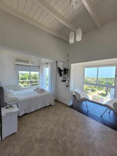 מיטה או מיטות בחדר ב-La Ramona Bed & Breakfast