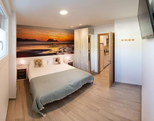 Postel nebo postele na pokoji v ubytování Apartamentos Lurralde