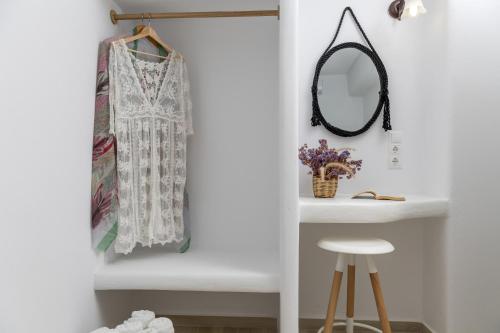 a bathroom with a mirror and a sink at Marine Dream in Plaka