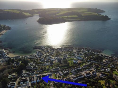 an aerial view of a town next to a body of water at Charlies in Saint Mawes