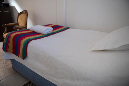 Hostal Casa 95にあるベッド