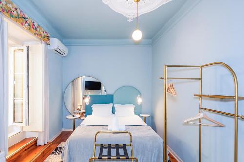 Ένα ή περισσότερα κρεβάτια σε δωμάτιο στο LR Guest House