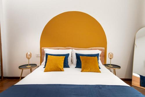 Ένα ή περισσότερα κρεβάτια σε δωμάτιο στο Quatrum Apartment
