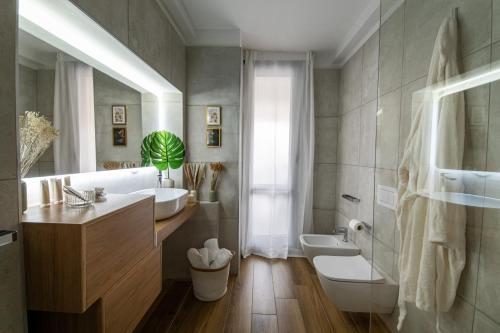 Ένα μπάνιο στο Quatrum Apartment