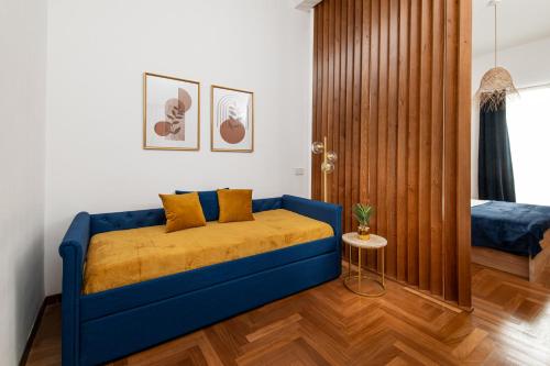Ένα ή περισσότερα κρεβάτια σε δωμάτιο στο Quatrum Apartment