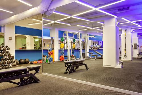 a gym with a lot of equipment and mirrors at NOA - Lüleci Hendek 54 in Istanbul