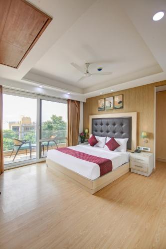 Limewood Stay - Unitech Cyber Parkにあるベッド