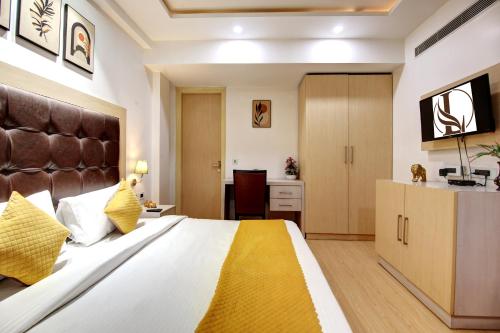 Limewood Stay - Unitech Cyber Parkにあるベッド