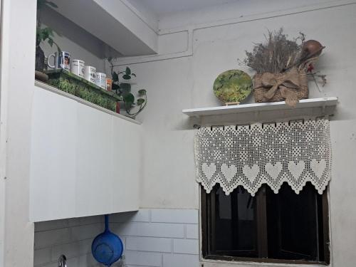 Кухня или мини-кухня в GIFTLAND HOMESTAY
