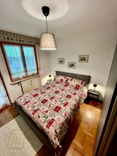 Postel nebo postele na pokoji v ubytování Appartamento sulle piste di Limone