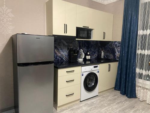 Una cocina o zona de cocina en SAMO GUEST Home