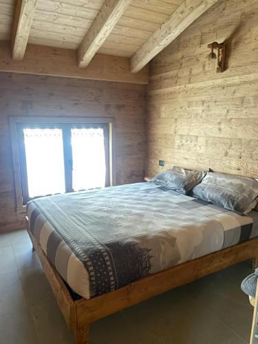 Voodi või voodid majutusasutuse Sabbionaccio Apartments & Spa toas