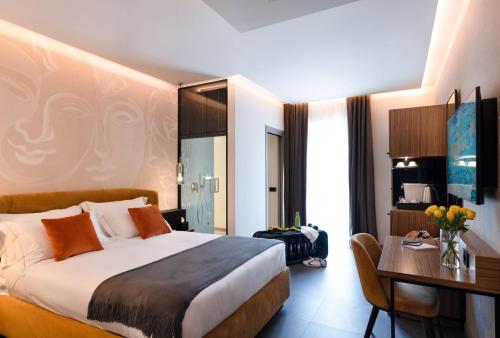 Postel nebo postele na pokoji v ubytování 3T Boutique Hotel