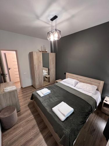 Ένα ή περισσότερα κρεβάτια σε δωμάτιο στο Regana Guest House Aghveran