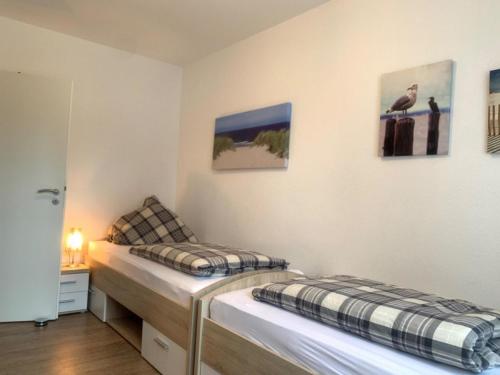 Postel nebo postele na pokoji v ubytování Wohnung 57