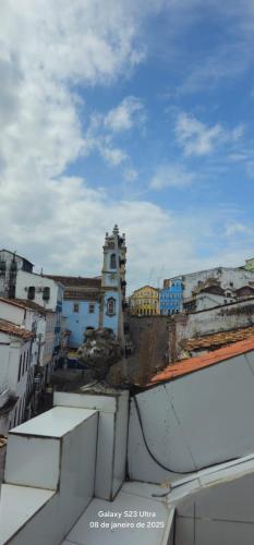 a view of a city from the roof of a building at Apartamento aconchegante para temporada in Salvador