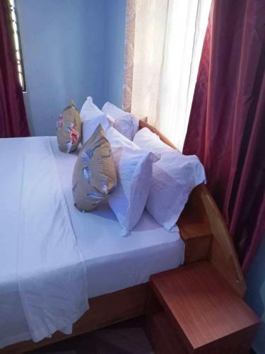 Ένα ή περισσότερα κρεβάτια σε δωμάτιο στο Grey Villa Hills