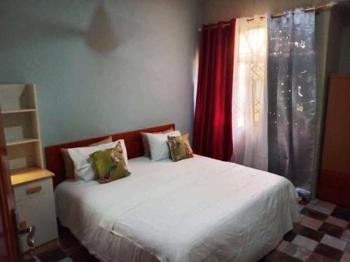 Ένα ή περισσότερα κρεβάτια σε δωμάτιο στο Grey Villa Hills