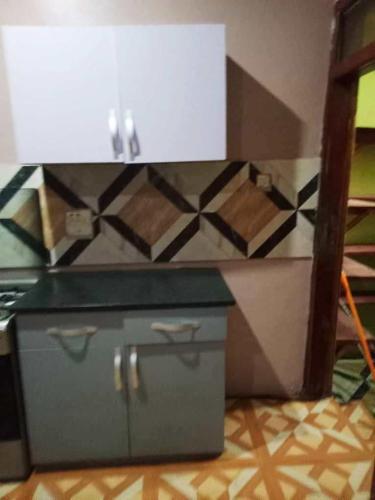 Η κουζίνα ή μικρή κουζίνα στο Grey Villa Hills